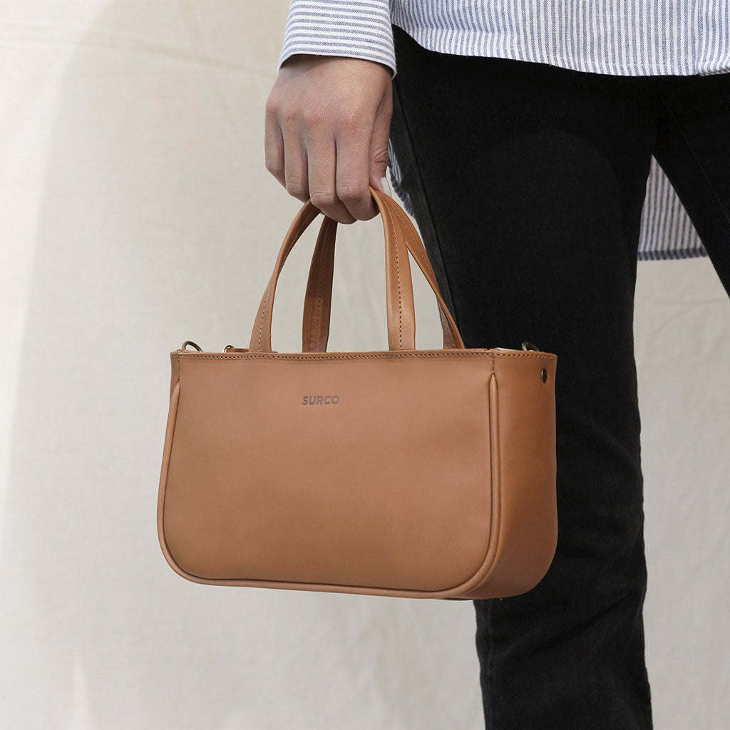 Cartera de mano y bandolera La Petite