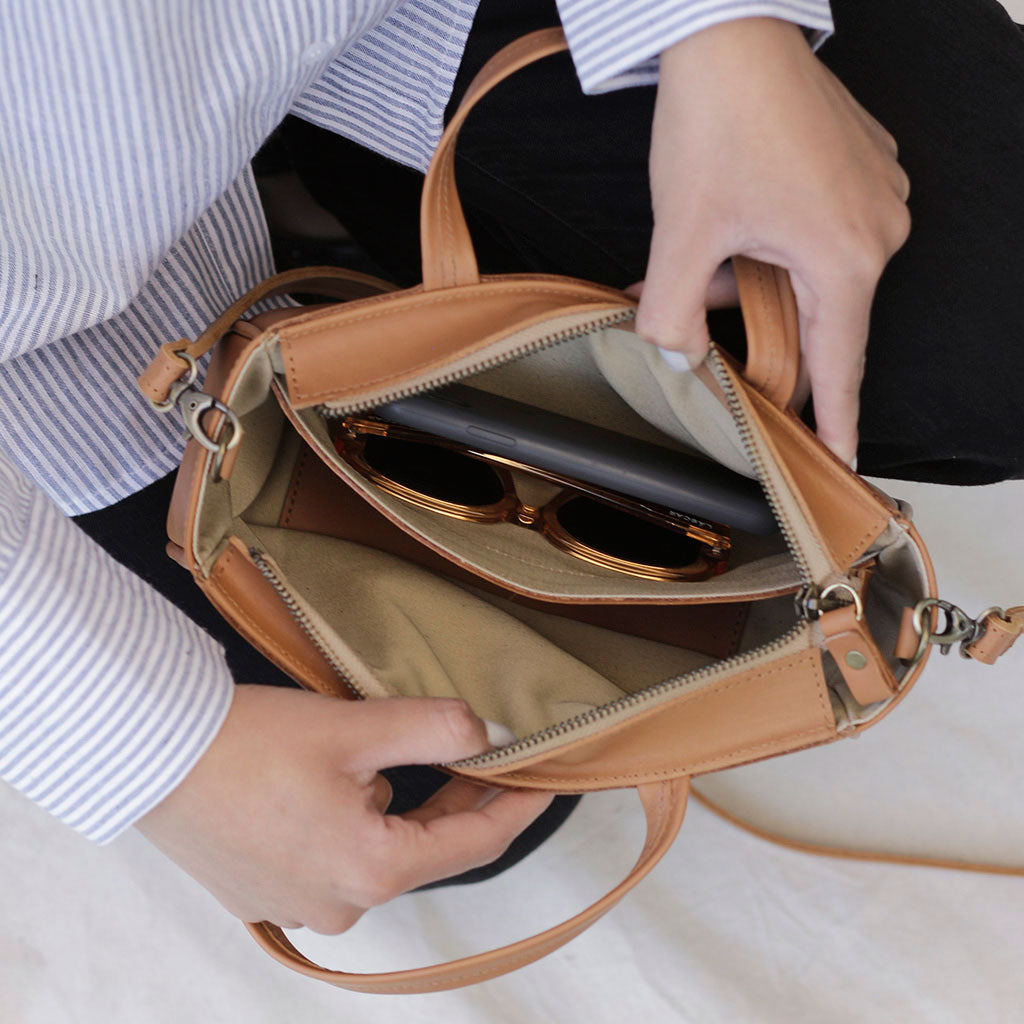 Cartera de mano y bandolera La Petite