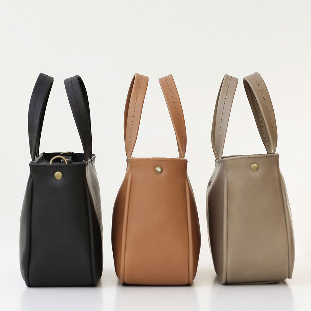 Cartera de mano y bandolera La Petite