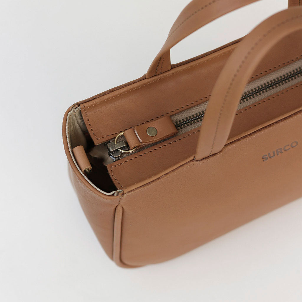 Cartera de mano y bandolera La Petite